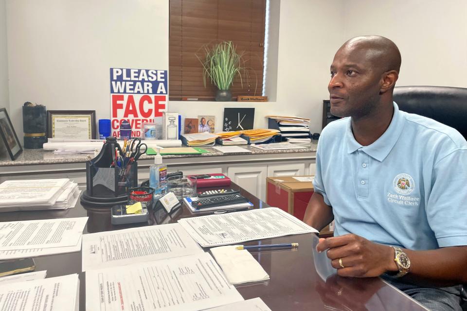 Circuit Clerk Zack Wallace, the top election official in Hinds County, speaks to The Associated Press at his office Wednesday, Nov. 8, 2023, in Jackson, Miss.