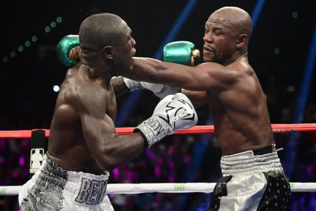 Floyd Mayweather (black trunks) and Andre Berto (white trunks) box during their WBA/WBC welterweight title bout at MGM Grand Garden Arena. Mayweather won via unanimous decision. Joe Camporeale-USA TODAY Sports