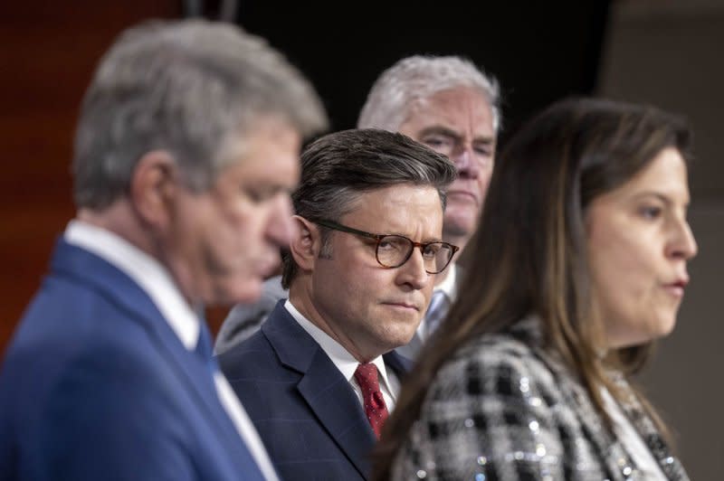 Speaker of the House Mike Johnson, R-La., listens as other GOP member speak at the press conference. The deadline to pass a bill and avert a shutdown is midnight Friday. Photo by Ken Cedeno/UPI