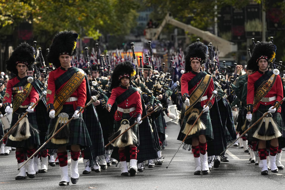 A pipe band marches during the Anzac Day march in Sydney, Monday, April 25, 2022. Australia and New Zealand commemorate Anzac Day every April 25, the date in 1915 when the Australia and New Zealand Army Corps landed on Turkey in an ill-fated campaign that created the soldiers' first combat of World War I. (AP Photo/Rick Rycroft)