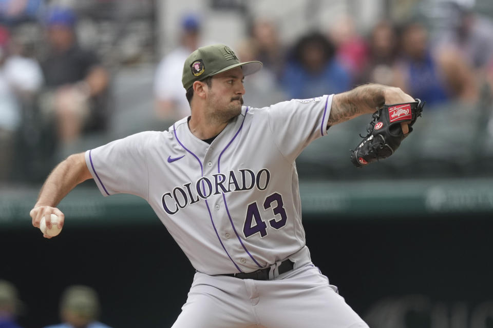 Colorado Rockies starting pitcher Connor Seabold throws the ball during the first inning of a baseball game against the Texas Rangers in Arlington, Texas, Sunday, May 21, 2023. (AP Photo/LM Otero)