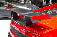 The Gallardo’s introduction in 2003 proved a watershed moment in that legendary company’s history, as well as that of parent Volkswagen. Once known for elegant touring cars that gave way to alien exotics typified by the outrageous Countach, Lamborghini announced it was playing for keeps in the supercar market with the fast-yet-dependable V-10 Gallardo. Stunning as it is, the model is now growing a bit long in the sharpened tooth, with a new version not due for a few years. Ergo, enter a hot rodded version of the car at this year’s Frankfurt auto show: dubbed the Super Trofeo Stradale, it boasts a race-worthy carbon fiber wing, lightened interior brimming with carbon and Alcantara and the same fire-breathing 565 hp found in the company’s ferocious Superleggera.