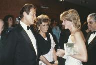 <p>Roger Moore may or may not have been inspired by his on-screen person, James Bond, when he picked out this tuxedo to meet Princess Diana at the London premiere of <em>Octopussy. </em></p>