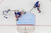 Apr 1, 2019; Uniondale, NY, USA; New York Islanders goaltender Robin Lehner (40) makes a save on Toronto Maple Leafs defenseman Nikita Zaitsev (22)during the third period at Nassau Veterans Memorial Coliseum. Mandatory Credit: Dennis Schneidler-USA TODAY Sports