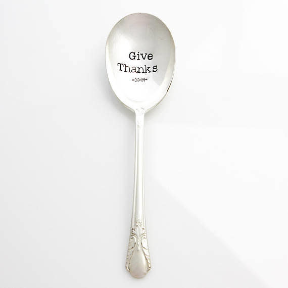 This <a href="https://www.etsy.com/listing/99984071/give-thanks-casserole-spoon-hand-stamped?ref=related-2" target="_blank">hand-stamped vintage serving spoon</a> looks way more expensive than it actually is.