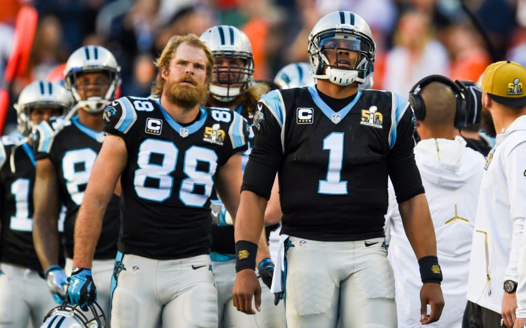 Carolina Panthers tight end Greg Olsen (88) stands on the sideline as the Panthers  play the Los Angeles Rams in the second half of an NFL football game in  Charlotte, North Carolina