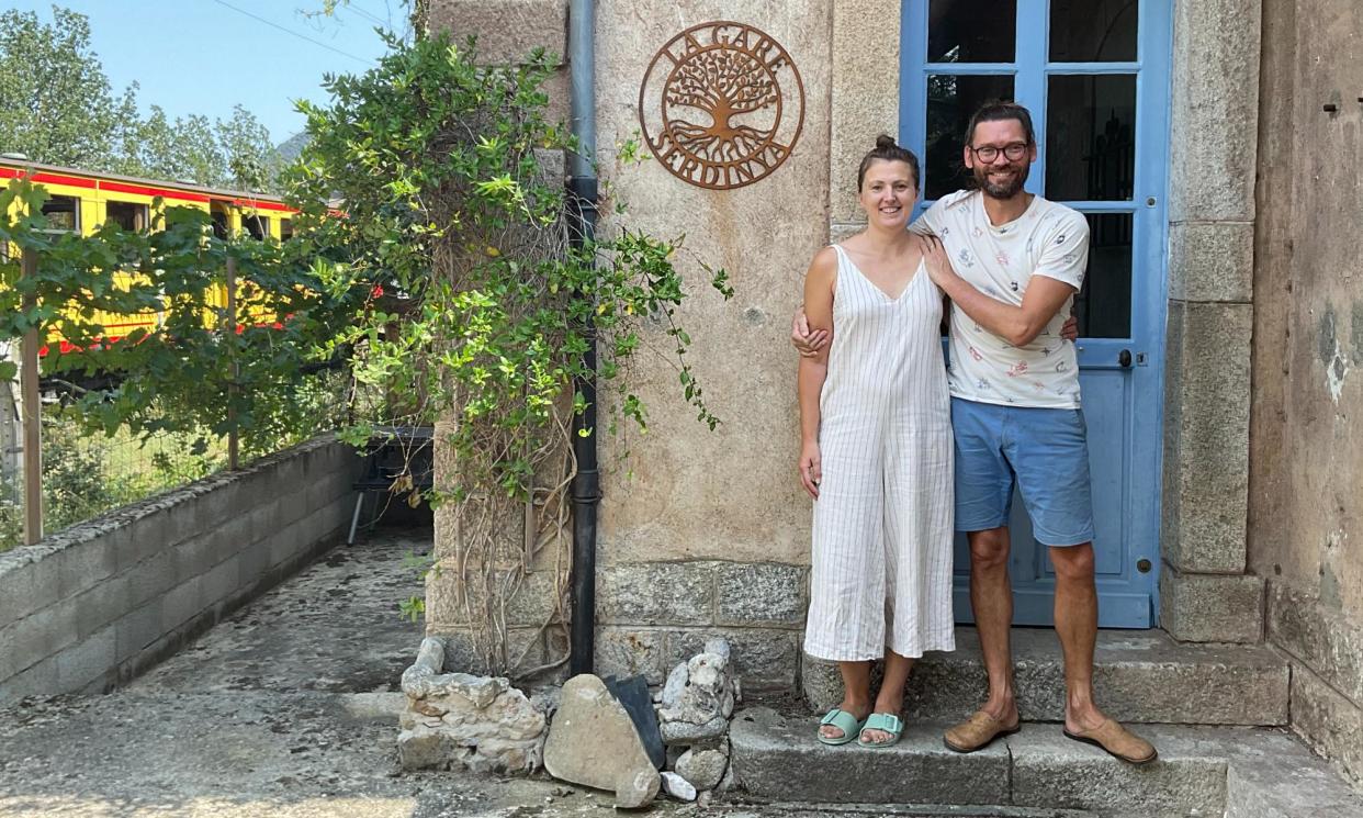 <span>Abby and Alastair outside their railway station in southern France.</span><span>Photograph: Abby/Guardian Community</span>