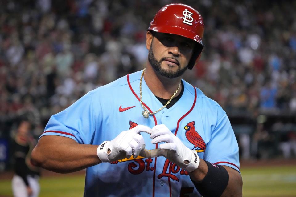 Aug. 20: St. Louis Cardinals designated hitter Albert Pujols celebrates after hitting a solo home run in the fourth inning against the Arizona Diamondbacks.