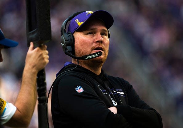 Minnesota Vikings co-defensive coordinator Adam Zimmer stands on the sidelines in the second quarter of the game against the Chicago Bears at U.S. Bank Stadium on January 9, 2022 in Minneapolis, Minnesota.