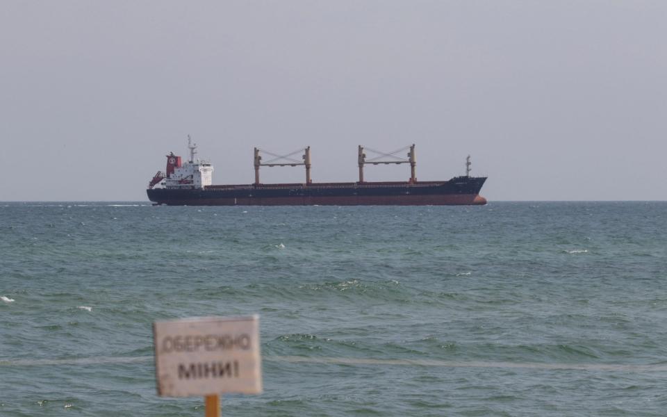 A warning sign is seen as the Liberian-flagged bulk carrier Osprey S arrives to the sea port in Chornomorsk - REUTERS