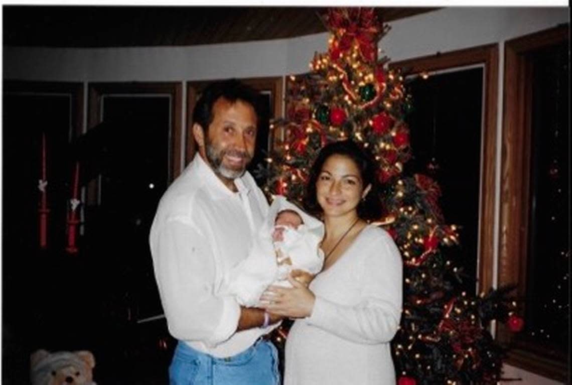 Emilio and Gloria Estefan in a family album photo with their daughter Emily Marie on her first Christmas in 1994. The photo is one of many from the Estefans’ family album to appear in the CD booklet for “Estefan Family Christmas.”