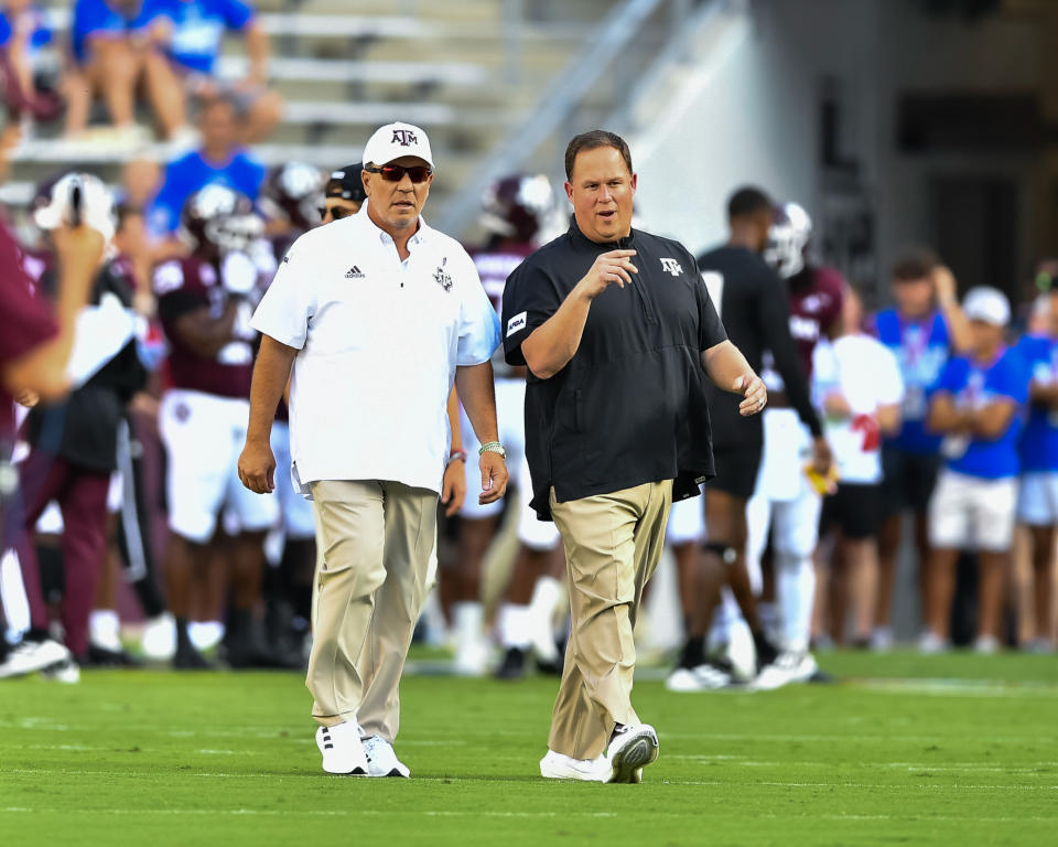 Sep 4, 2021; College Station, Texas, USA; Texas A&M Aggies head coach Jimbo Fisher and defensive coordinator Mike Elko prior to the game against the Kent State Golden Flashes at Kyle Field. Mandatory Credit: Maria Lysaker-USA TODAY Sports