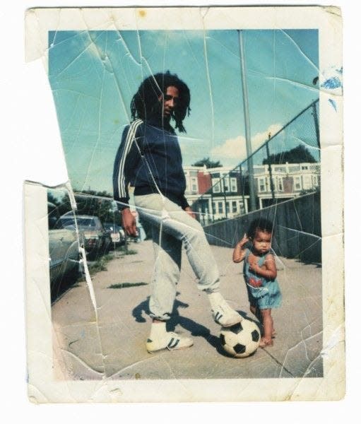 Bob Marley in the fall of 1976 in front of his house at 23rd and Tatnall streets in Wilmington.