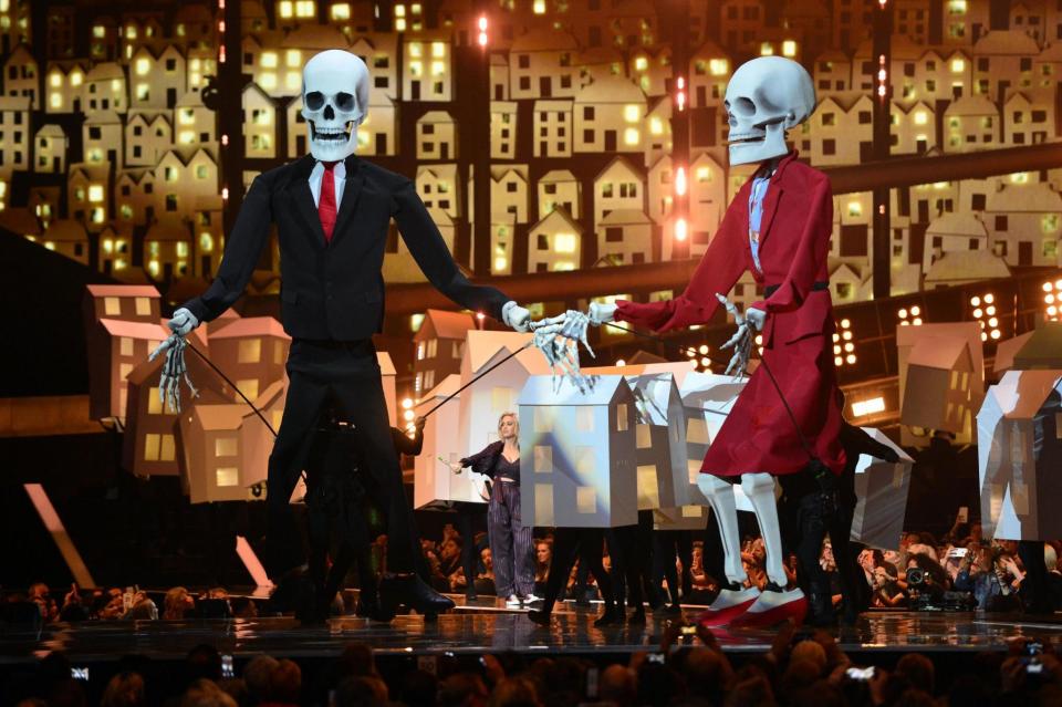 Statement: Katy Perry brings on skeletons that resemble Donald Trump and Theresa May (Dominic Lipinski/PA)