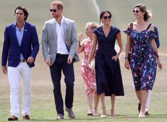 <p>Chris Jackson/Getty</p> Sentebale Ambassador Nacho Figuares, wife Delfina Blaquier, Meghan Duchess of Sussex and Prince Harry, Duke of Sussex arrive for the Sentebale Polo 2018