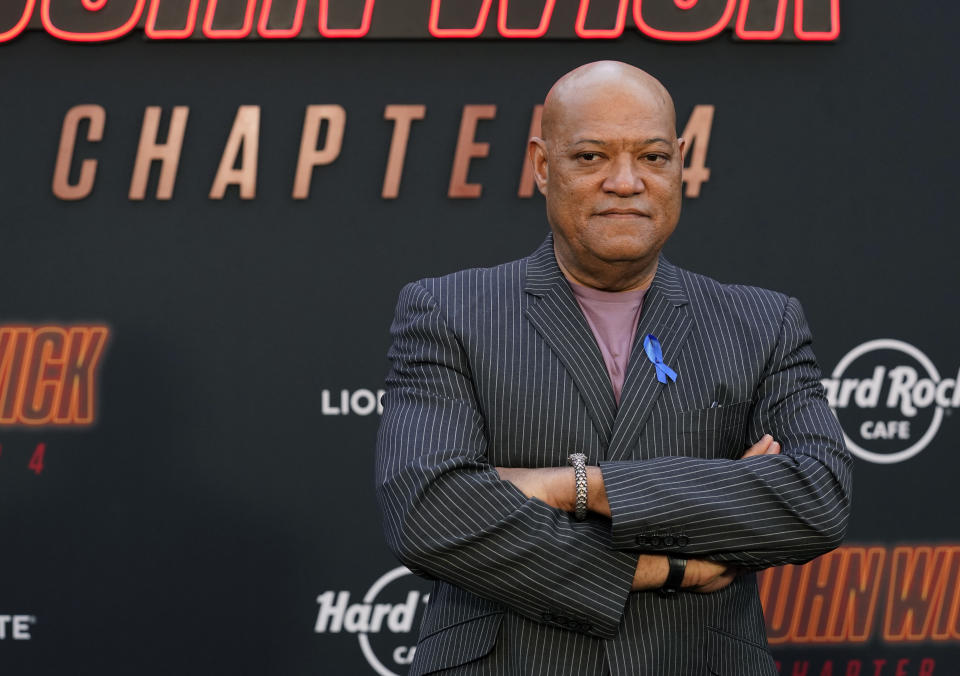 FILE - Laurence Fishburne poses at the premiere of "John Wick: Chapter 4," Monday, March 20, 2023, in Los Angeles. Fishburne turns 62 on July 30. (AP Photo/Chris Pizzello, File)