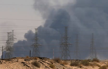 Smoke is seen following a fire at an Aramco factory in Abqaiq