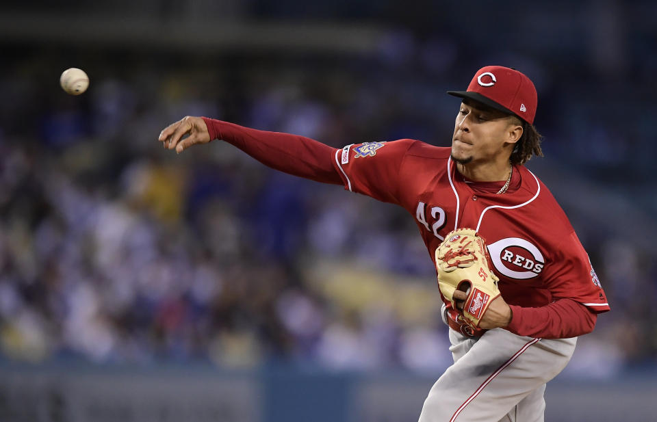 Cincinnati Reds starting pitcher Luis Castillo throws to the plate during the first inning of a baseball game against the Los Angeles Dodgers, Monday, April 15, 2019, in Los Angeles. (AP Photo/Mark J. Terrill)