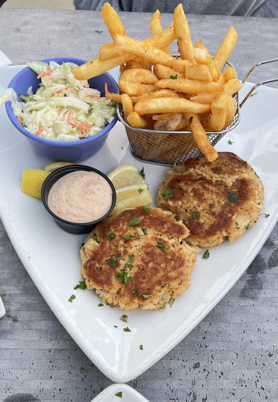 At Island Beach Bar & Restaurant in Ocean Village in Fort Pierce, the crab cakes are lump Maryland-style crab combined with breadcrumbs, spices and mayo. The sauteed exterior yielded tender and flavorful cakes with a tangy remoulade sauce on the side.