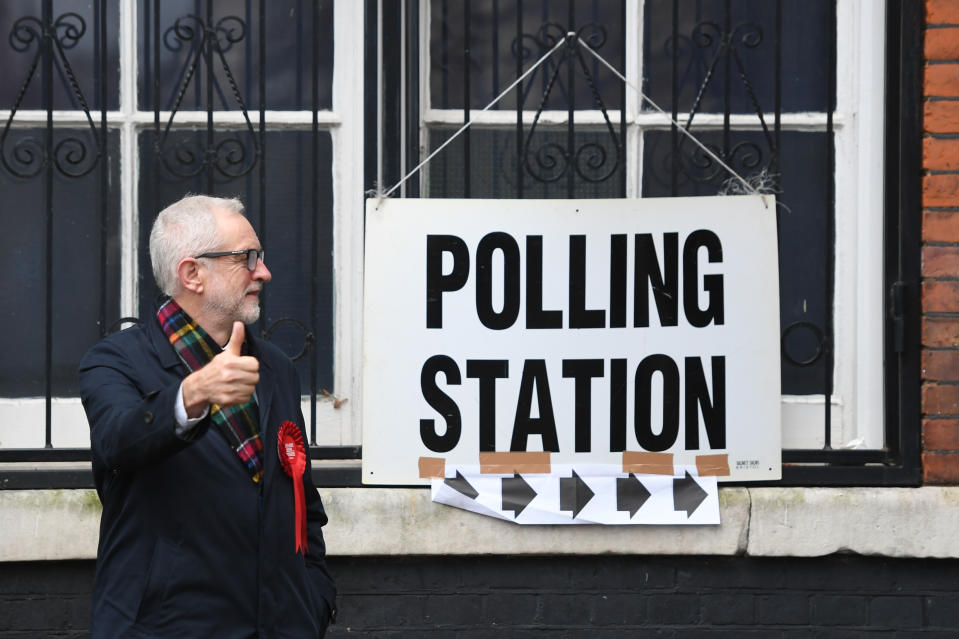 Labour leader Jeremy Corbyn gives a thumbs up as he and his wife Laura Alvarez cast their votes in the 2019 General Election at the polling station at Pakeman Primary School in Islington, north London, (Photo by Joe Giddens/PA Images via Getty Images)