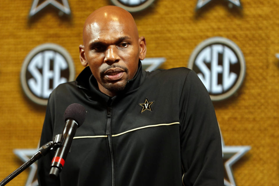 FILE - In this Wednesday, Oct. 16, 2019, file photo, Vanderbilt head coach Jerry Stackhouse speaks during the Southeastern Conference NCAA college basketball media day in Birmingham, Ala. Juwan Howard took over his former team when he replaced John Beilein at Michigan, and Stackhouse was hired to be the new coach at Vanderbilt. Both of them starred as players in the early-to-mid 1990s and went on to lengthy NBA careers. (AP Photo/Butch Dill, File)