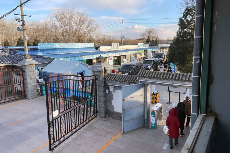 Hearses outside a funeral home in Beijing