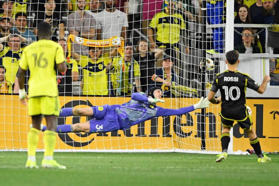 Nashville goalkeeper Elliot Panicco blocks a penalty kick against the Crew on Saturday.