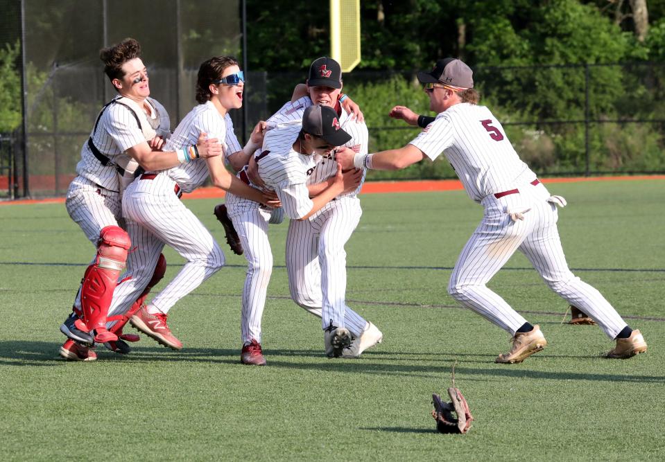 Albertus Magnus players celebrate after defeating Croton, during the Albertus Magnus vs. Croton-Harmon Section One Class B baseball championships at Purchase College in Purchase, New York, Mat 27, 2023. Albertus Magnus defeated Croton-Harmon, 4-1.