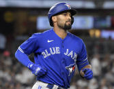 FILE - Toronto Blue Jays' Marcus Semien runs the bases on a home run against the New York Yankees during the fifth inning of a baseball game Tuesday, Sept. 7, 2021, at Yankee Stadium in New York. The Texas Rangers have reached an agreement on a seven-year contract with Gold Glove second baseman and potential shortstop Marcus Semien, according to a source familiar with the deal. That person spoke to The Associated Press on condition of anonymity Sunday night, Nov. 28, 2021 because the deal was not finalized. ESPN, which first reported the agreement, said it was worth $175 million. (AP Photo/Bill Kostroun, File)