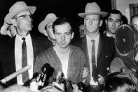 President John F. Kennedy’s murderer Lee Harvey Oswald during a press conference after his arrest in Dallas on Nov. 22, 2963. Lee Harvey Oswald was killed by Jack Ruby on 24 Nov. 24, 1963 on the eve of Kennedy’s burial. (Photo: Stringer/AFP/Getty Images)