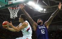 2016 Rio Olympics - Basketball - Final - Men's Gold Medal Game Serbia v USA - Carioca Arena 1 - Rio de Janeiro, Brazil - 21/8/2016. Nemanja Nedovic (SRB) of Serbia and Demarcus Cousins (USA) of the USA. REUTERS/Jim Young