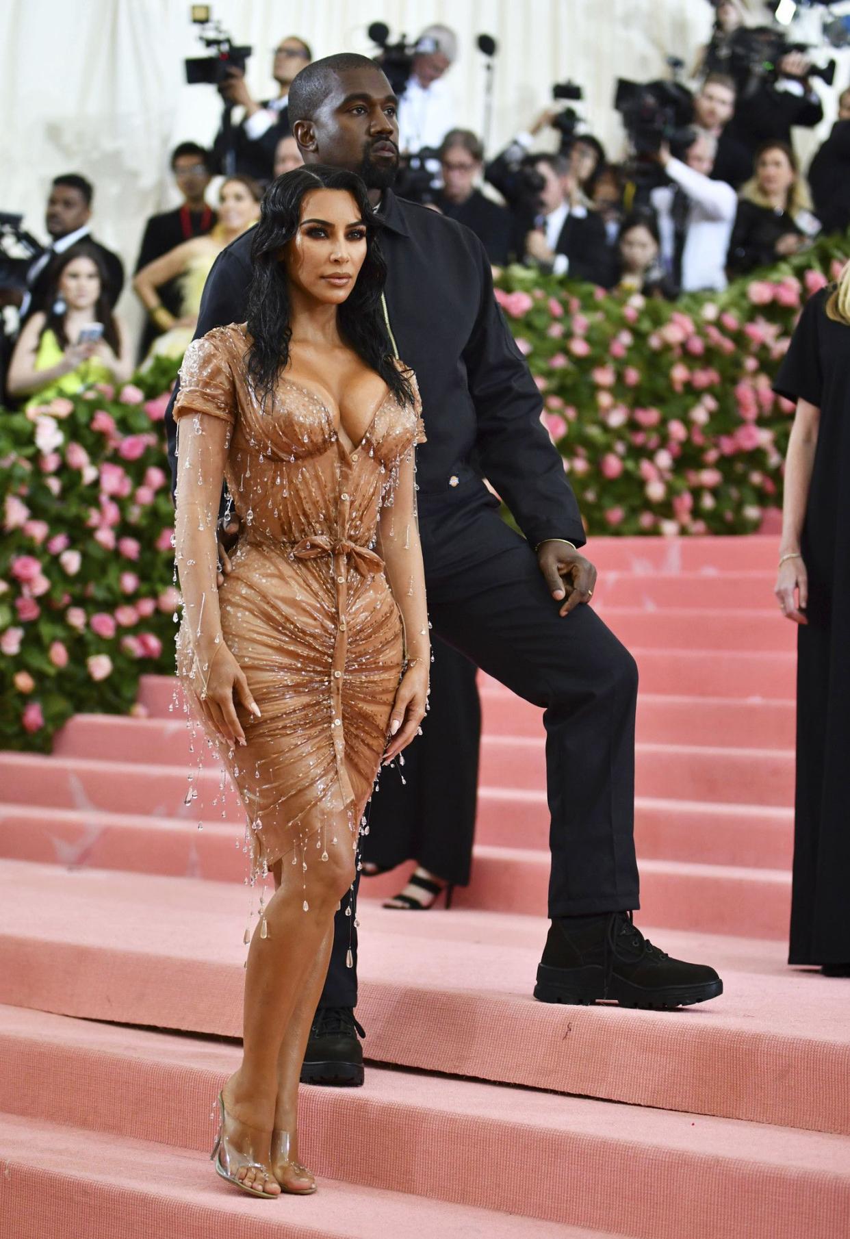 Kim Kardashian West, left, and Kanye West attend The Metropolitan Museum of Art's Costume Institute benefit gala celebrating the opening of the "Camp: Notes on Fashion" exhibition on Monday, May 6, 2019, in New York.