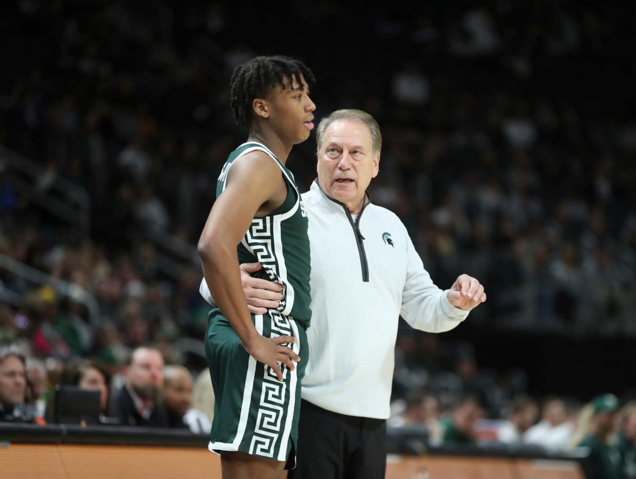 Michigan State coach Tom Izzo talks with guard Jeremy Fears Jr. during MSU's 88-64 win over Baylor on Saturday, Dec.16, 2023, at Little Caesars Arena.