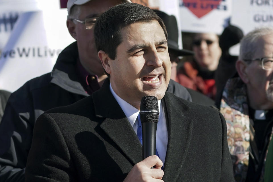 FILE - In this Nov. 7, 2019 file photo, Wisconsin Attorney General Josh Kaul speaks during a rally at the State Capitol in Madison, Wis. A new report a report released by the state attorney general on Thursday, Jan. 9, 2020 finds that law enforcement agencies in Wisconsin are not consistently reporting human trafficking cases. Kaul told The Associated Press that the report shows more work needs to be done to improve data collection, raise awareness of the problem and expand support for victims.(Steve Apps/Wisconsin State Journal via AP, File)