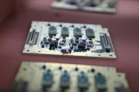 FILE PHOTO: Printed circuit boards are seen at the production facility of the automated test equipment designer and solutions provider Aemulus Holdings Berhad in Penang