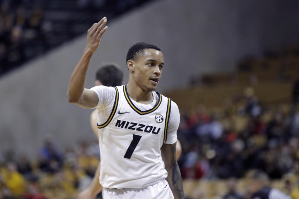 Missouri's Xavier Pinson celebrates after making a 3-point basket during the second half of the team's NCAA college basketball game against Georgia on Tuesday, Jan. 28, 2020, in Columbia, Mo. Missouri won 72-69. (AP Photo/Jeff Roberson)