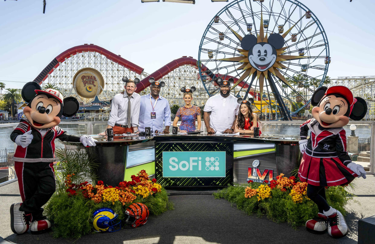 ANAHEIM, CA - FEBRUARY 10: Mickey and Minnie pose for a photo with ESPN hosts following a Super Bowl preview show broadcast from Disney California Adventure in Anaheim on Thursday, February 10, 2022 Pictured, from left, are co-hosts Dan Orlovsky,
Keyshawn Johnson, Laura Rutledge, Marcus Spears and Mina Kimes. (Photo by Leonard Ortiz/MediaNews Group/Orange County Register via Getty Images)