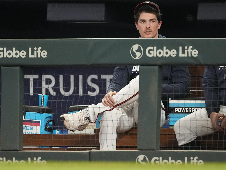 Atlanta Braves starting pitcher Max Fried (54) sits in the dugout during a baseball game against the Boston Red Sox Tuesday, May 9, 2023, in Atlanta. Fried was placed on the 15-day injured list with a strained forearm earlier in the day. (AP Photo/John Bazemore)