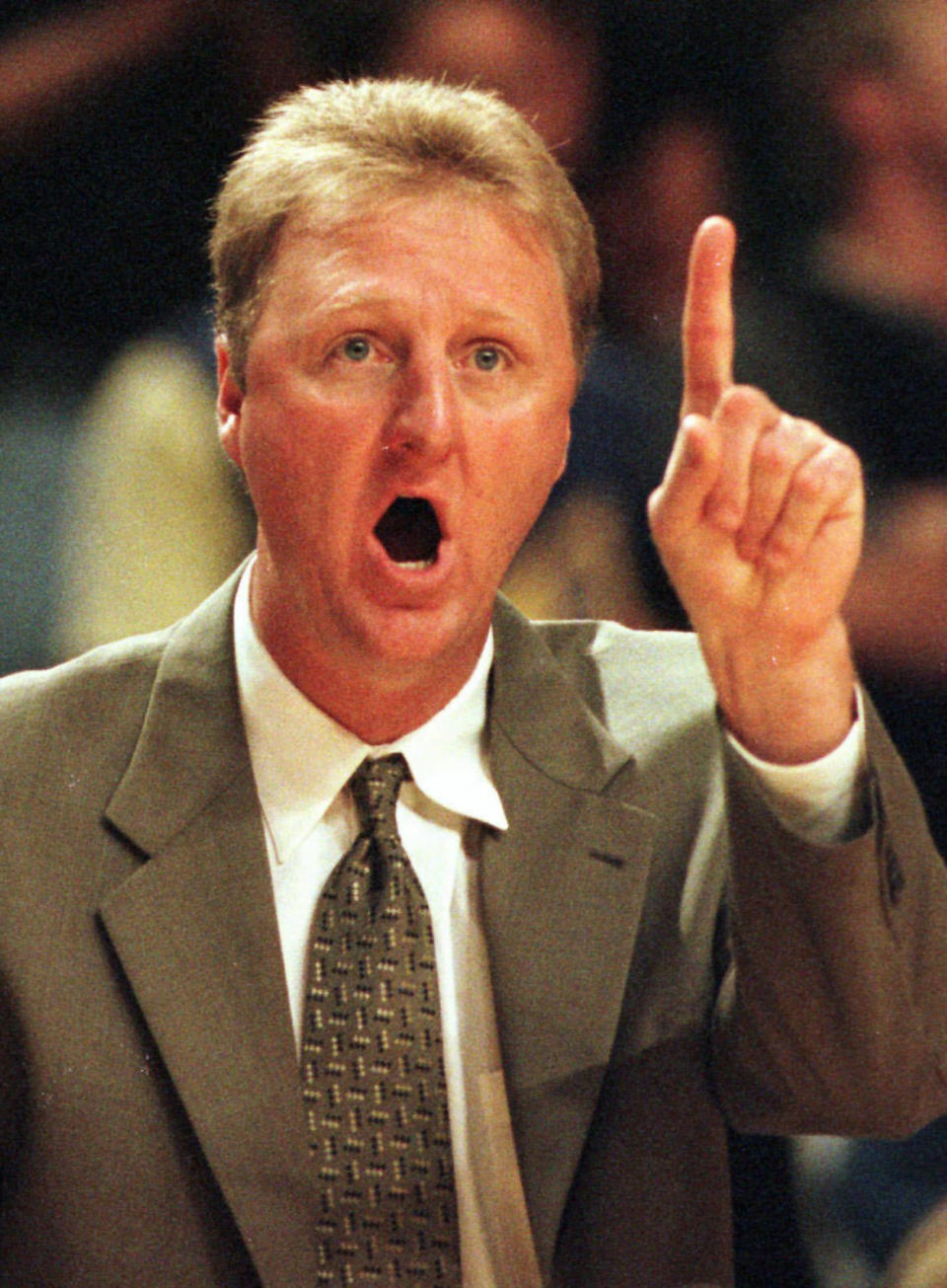 FILE - This May 23, 1998 file photo shows Indiana Pacers coach Larry Bird signaling to his team during the second half of Indiana's 107-105 win over the Chicago Bull in Game 3 of the Eastern Conference finals, in Indianapolis. The Indiana Pacers have parted ways with Bird. Owner Herb Simon announced the move Wednesday, June 27, 2012, one day before the NBA draft. (AP Photo/Al Behrman, File)