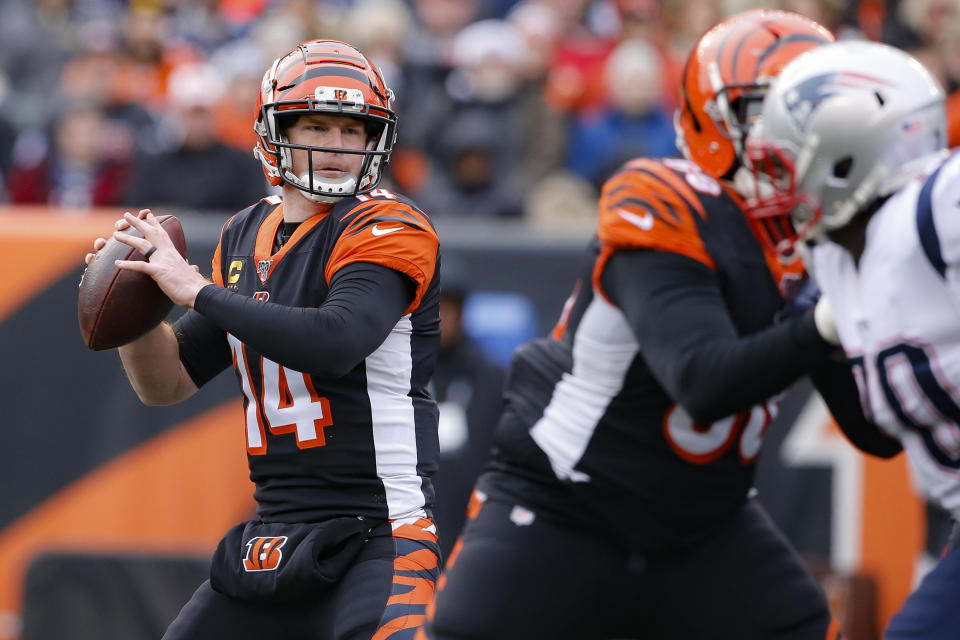 Cincinnati Bengals quarterback Andy Dalton (14) passes in the first half of an NFL football game against the New England Patriots, Sunday, Dec. 15, 2019, in Cincinnati. (AP Photo/Gary Landers)