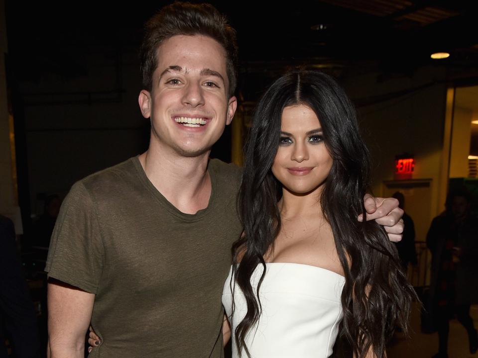 Charlie Puth (L) and Selen Gomez attend Z100's Jingle Ball 2015 at Madison Square Garden on December 11, 2015 in New York City