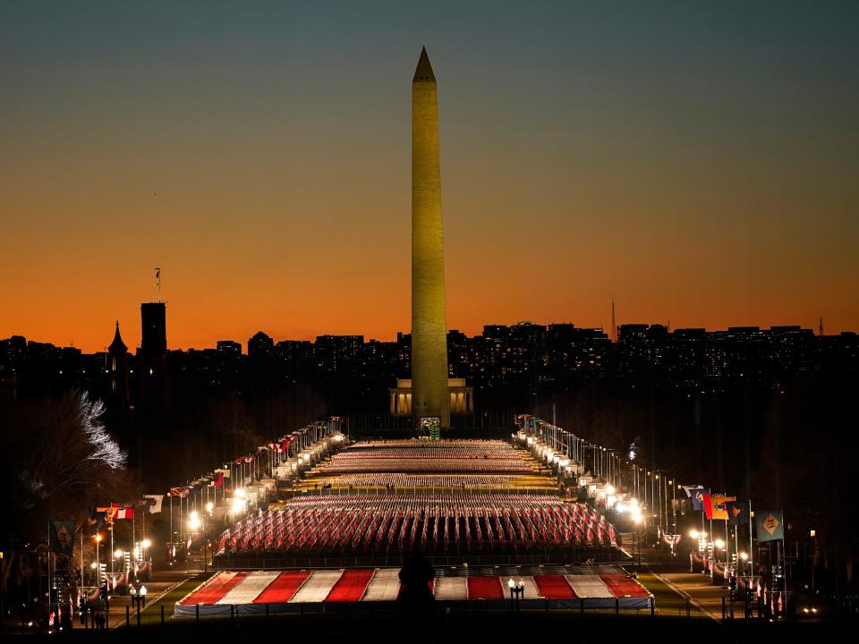 The Washington Monument was closed to members of the public for Joe Biden’s inauguration, with the crowds replaced by a ‘Field of Flags’ exhibitionAP