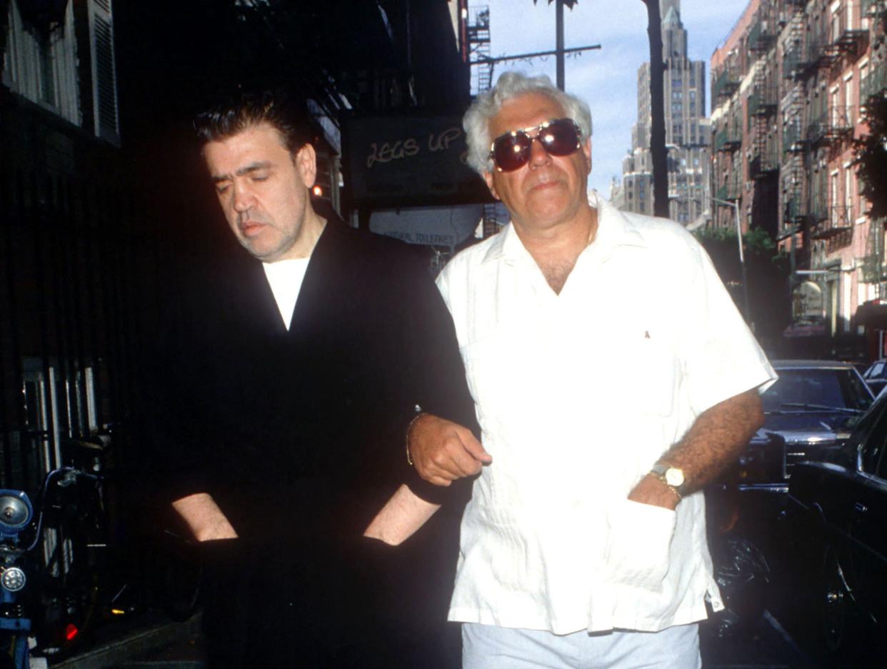 Vincent "The Chin" Gigante (.), boss of the Genovese crime family, walks with his brother, Father Louis Gigante, on March 15, 1988, near his apartment in Greenwich Village in New York City. 