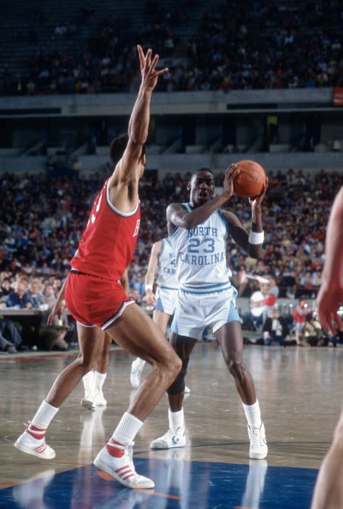 UNSPECIFIED – CIRCA 1982: Michael Jordan #23 of the North Carolina Tar Heels looks to pass the ball during an NCAA basketball game circa 1982 at the Greensboro Coliseum in Greensboro, North Carolina. (Photo by Focus on Sport/Getty Images) *** Local Caption *** Michael Jordan