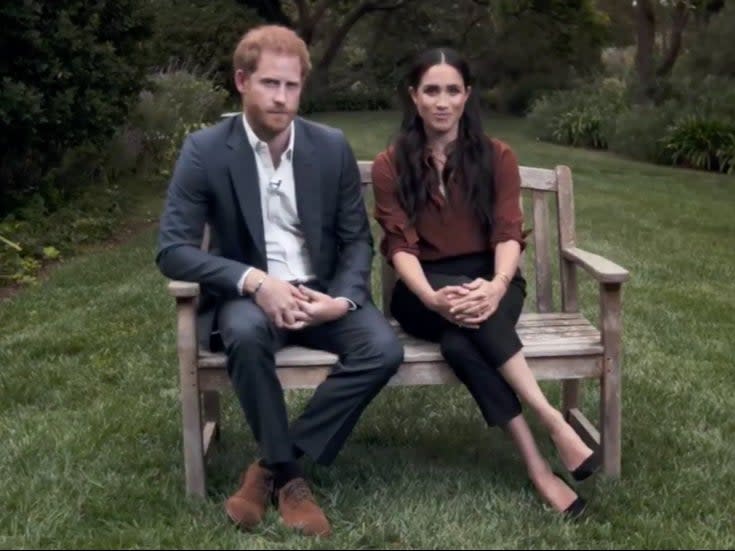 Prince Harry and Meghan Markle face criticism over voting comments  (Time )