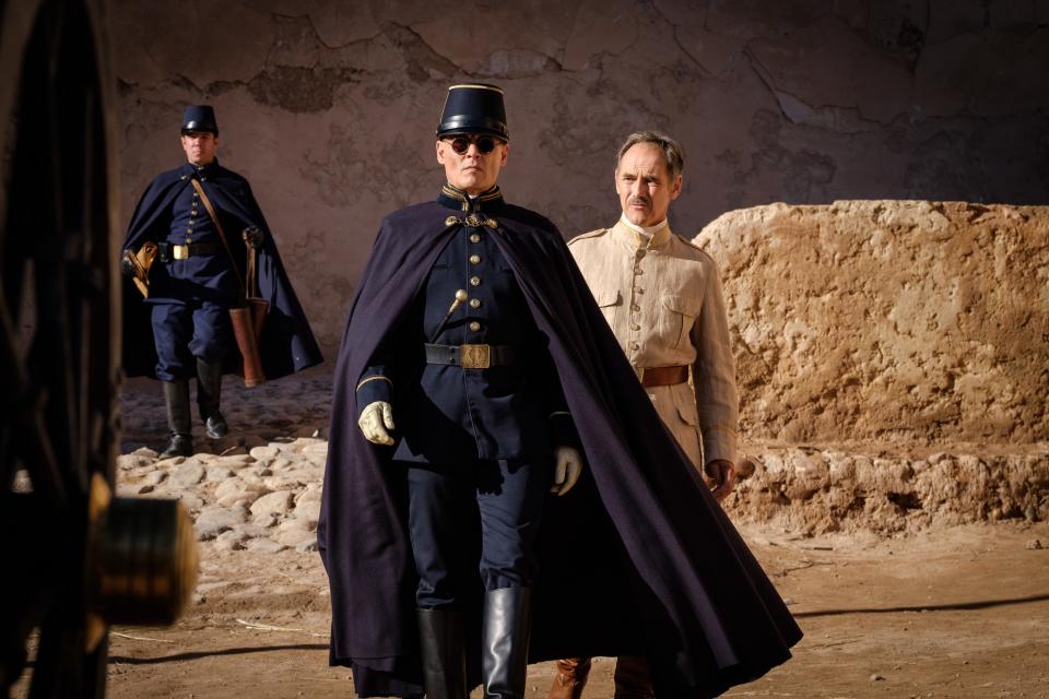 Colonel Joll (Johnny Depp) is not a welcome visitor for The Magistrate (Mark Rylance) in "Waiting for the Barbarians."