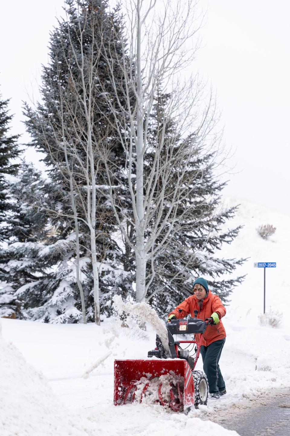 People are pictured plowing snow after an overnight storm in Draper on Wednesday, Jan. 10, 2024. | Marielle Scott, Deseret News