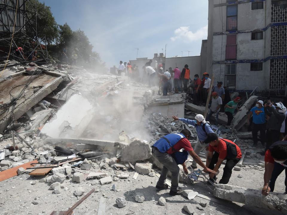 Rescuers have worked around the clock to pull survivors from the rubble: AFP/Getty Images