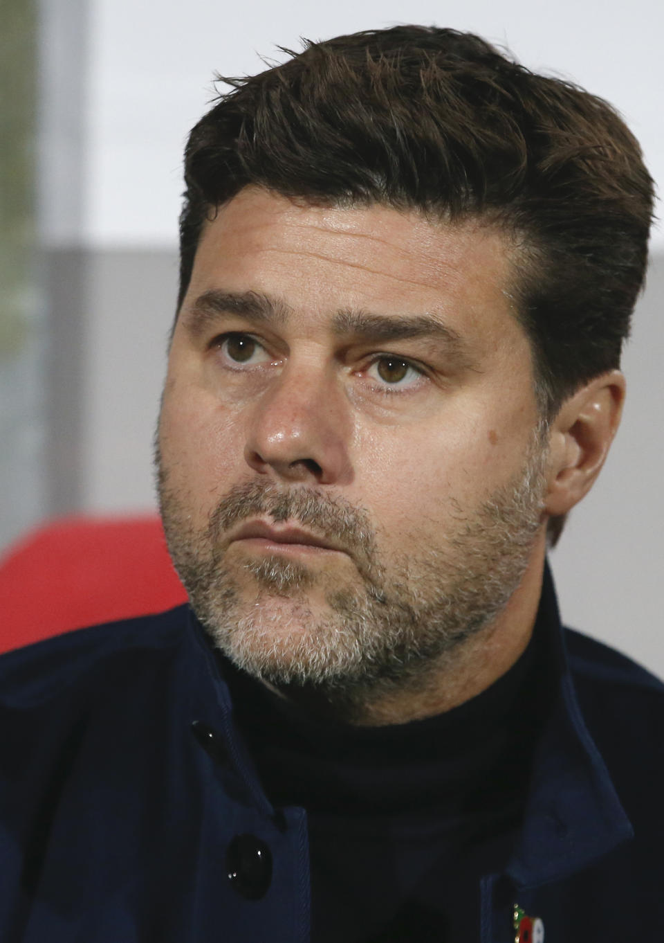 Tottenham's manager Mauricio Pochettino sits on the bench before the Champions League group B soccer match between Red Star and Tottenham, at the Rajko Mitic Stadium in Belgrade, Serbia, Wednesday, Nov. 6, 2019. (AP Photo/Darko Vojinovic)