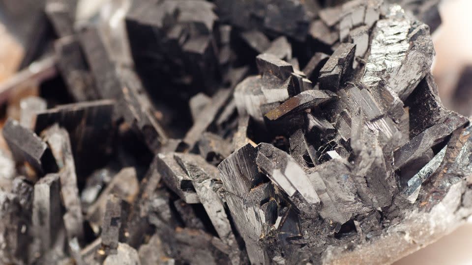 Wolframite, which is closely related to tungsten, is used in lightbulb filament manufacturing. - Wirestock/iStockphoto/Getty Images